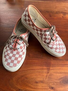 Vans checkered boat shoe sneaker with leather laces and boat soles.